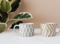 Pair of patterned mugs on a table