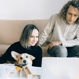 two women looking at computer at home