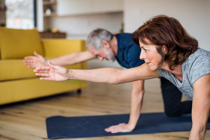 couple doing Pilates at home