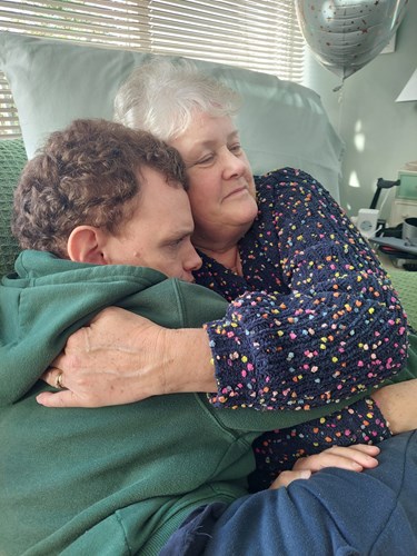 A photo of two people embracing
