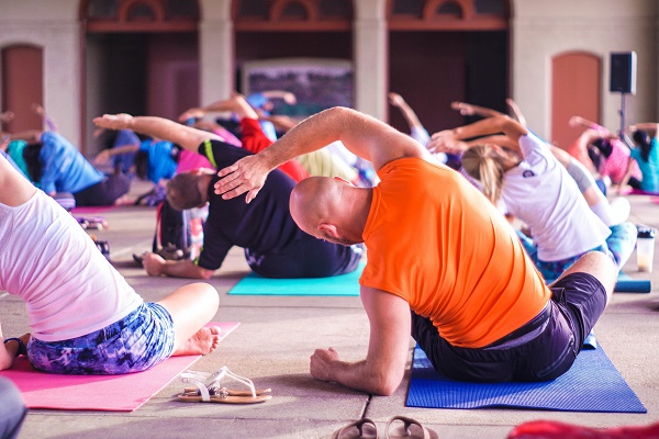 people stretching at group exercise session