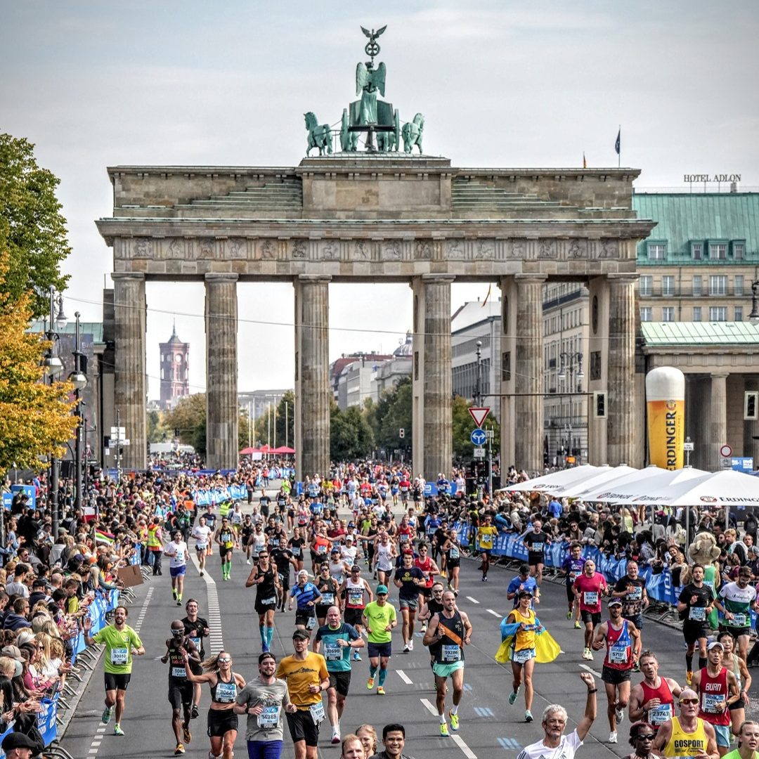 Runners at Brandenburg gate, Berlin