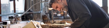 person at workbench