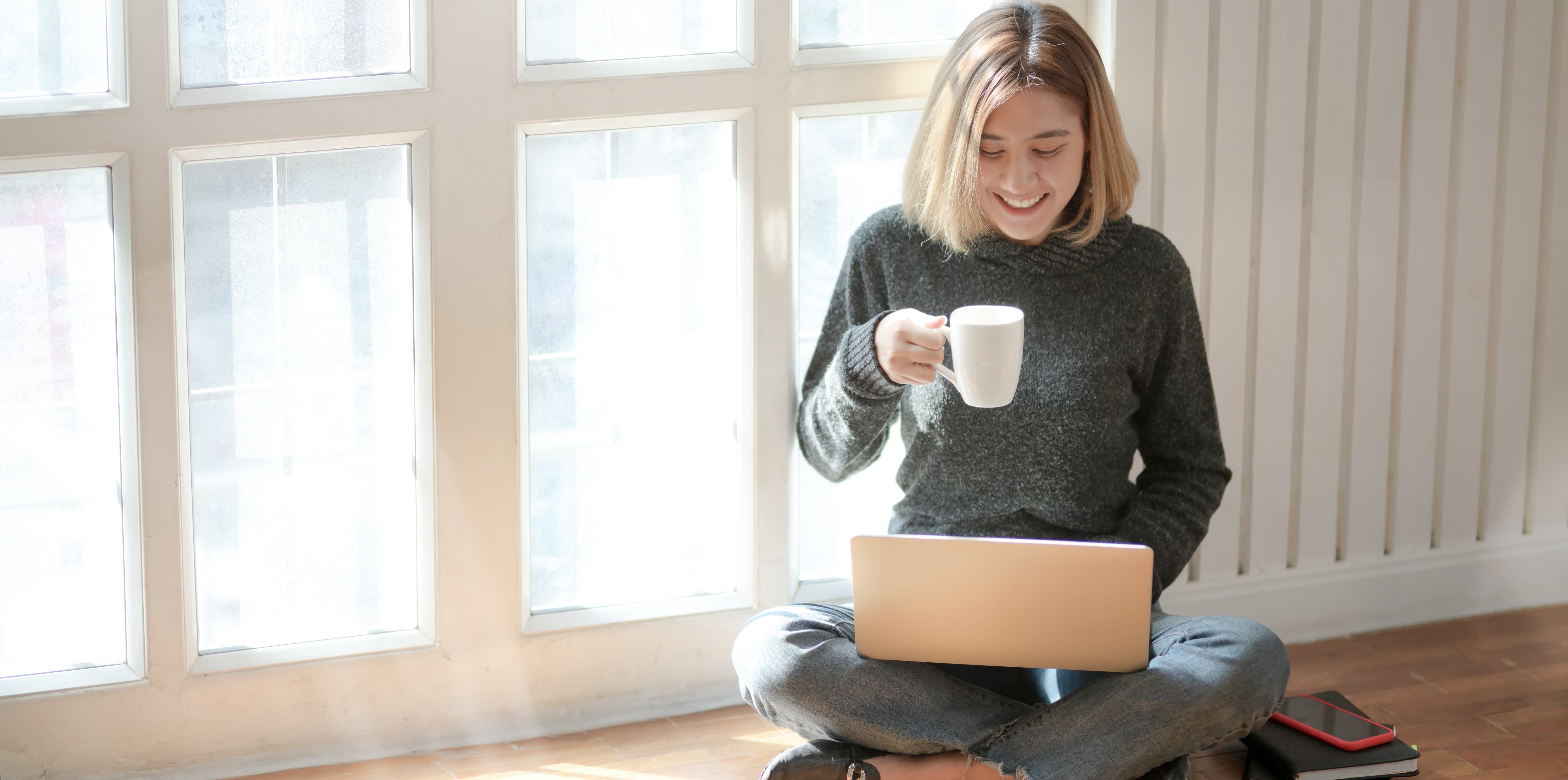 Woman In Gray Sweater Drinking Coffee 