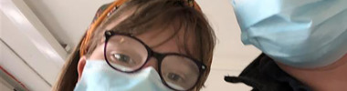 Adam and his daughter Evie taking a selfie while wearing face masks