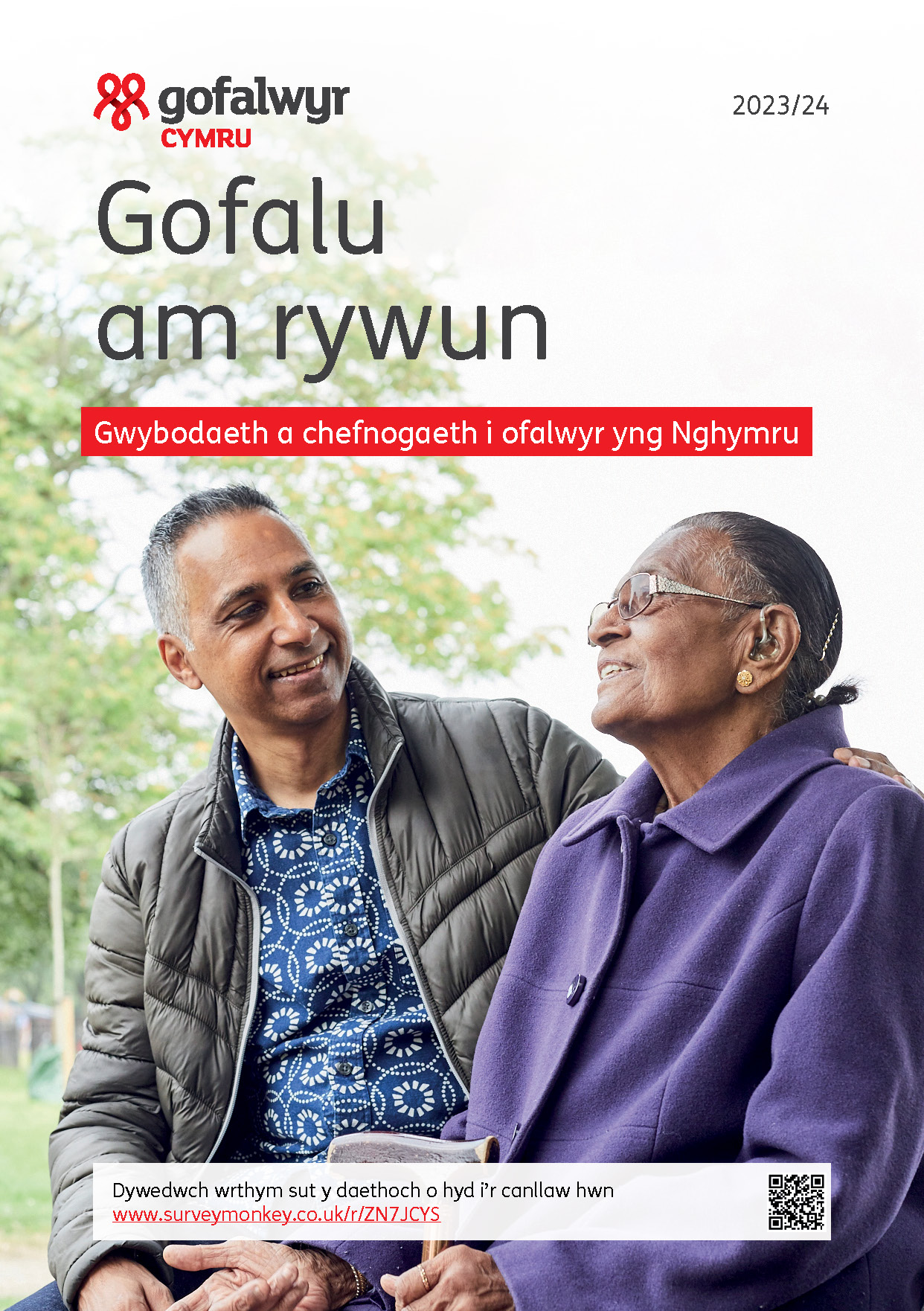 Cover Looking after someone Wales. Photo of smiling mother  and adult son sitting outdoors talking