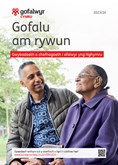 Cover Looking after someone Wales. Photo of smiling mother  and adult son sitting outdoors talking