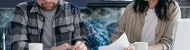 two people discussing finances