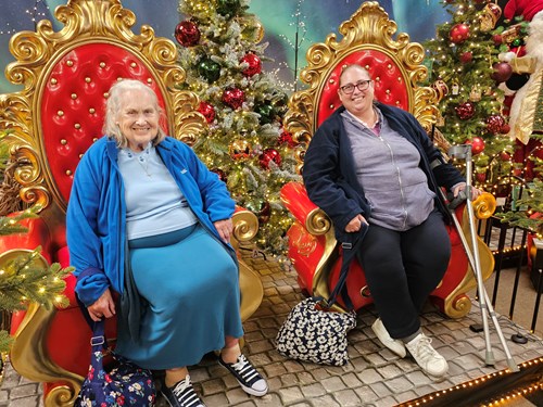 Photo of two people seated